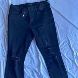 Simple black ripped jeans